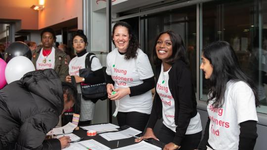 Young Londoners Fund volunteers registering people at Youth Led Documentary screening
