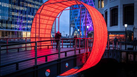 Canary Wharf winter lights, light up circle shape wrapped around a bridge